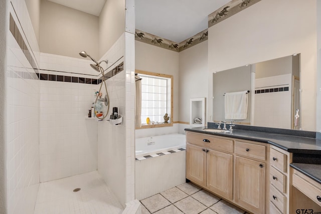 bathroom featuring vanity, tile patterned floors, and independent shower and bath