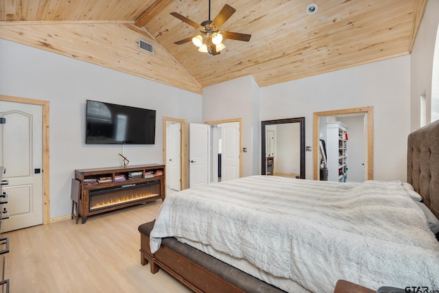 bedroom featuring wood ceiling, ceiling fan, beam ceiling, high vaulted ceiling, and light hardwood / wood-style flooring