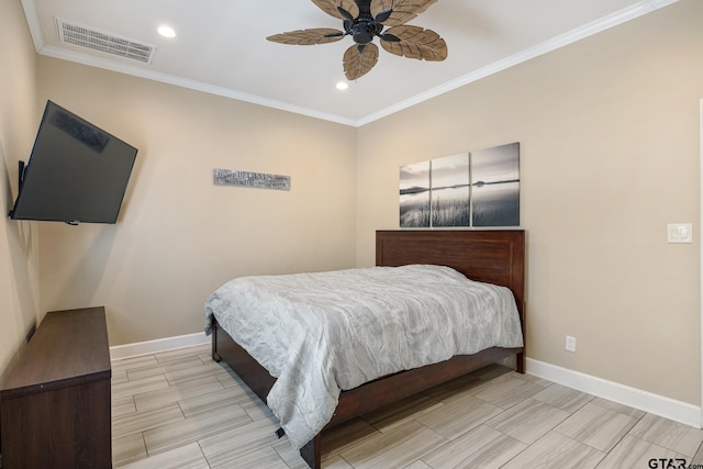 bedroom with ceiling fan and ornamental molding