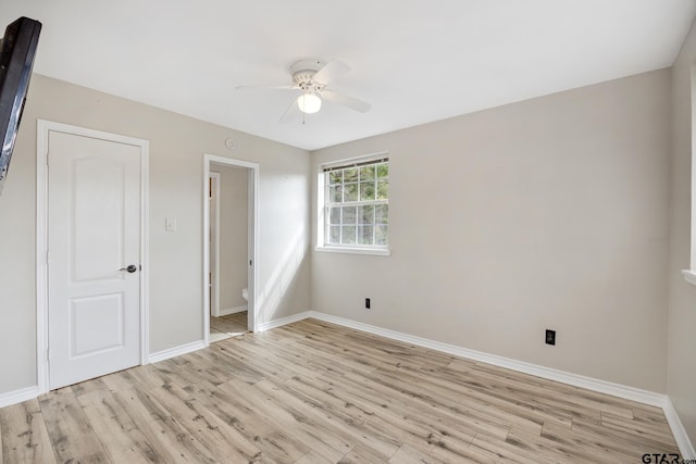 unfurnished bedroom featuring ceiling fan and light hardwood / wood-style flooring