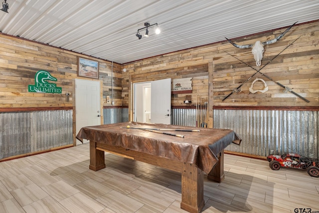 playroom featuring wooden walls and pool table