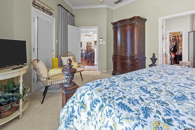 carpeted bedroom featuring ornamental molding