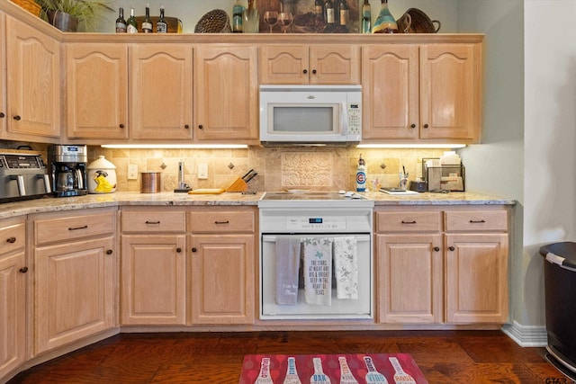 kitchen featuring light brown cabinets, decorative backsplash, dark hardwood / wood-style flooring, and white appliances