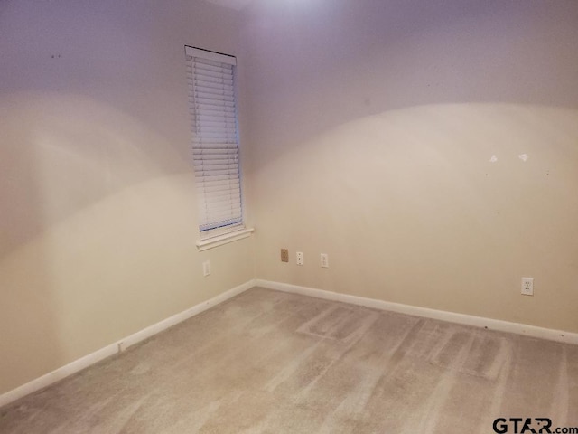 empty room with carpet floors