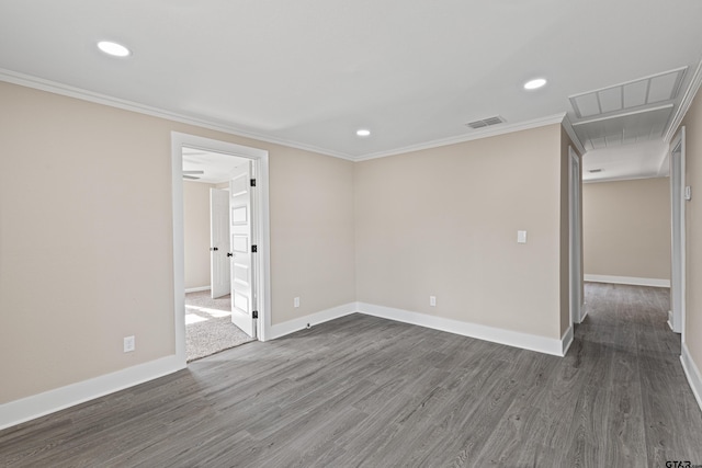 unfurnished room with crown molding and dark hardwood / wood-style floors