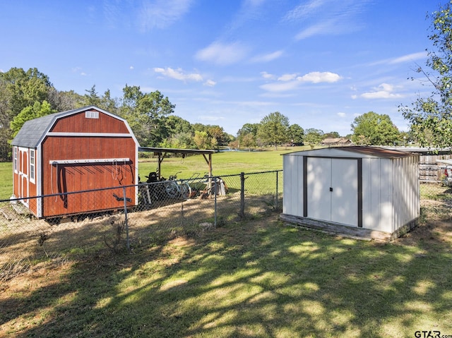 view of outdoor structure featuring a yard and a rural view