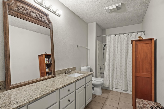 full bathroom with shower / bathtub combination with curtain, vanity, a textured ceiling, tile patterned floors, and toilet