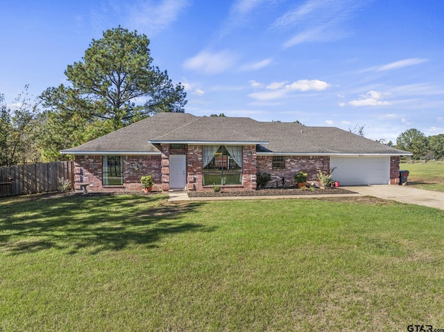 ranch-style house with a garage and a front yard