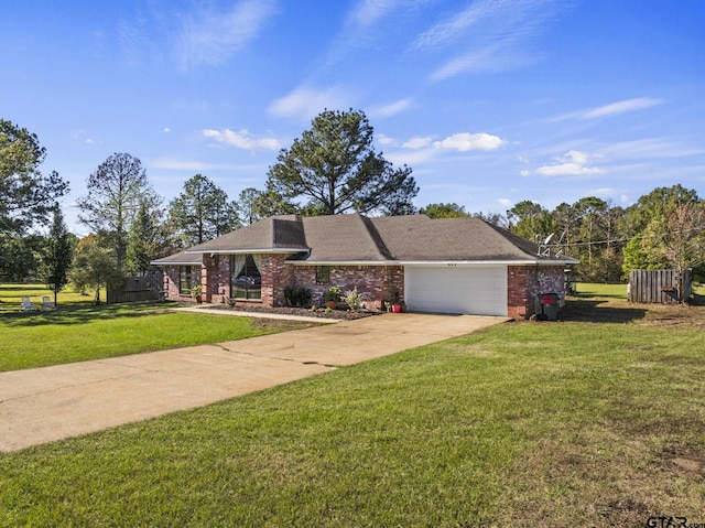 ranch-style house with a garage and a front lawn