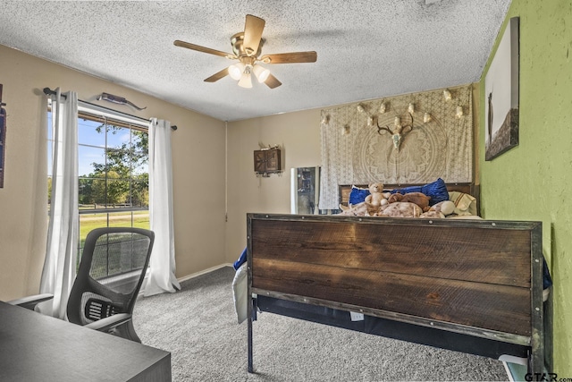 bedroom with ceiling fan, carpet, access to outside, and a textured ceiling