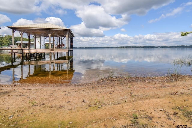 dock area with a water view