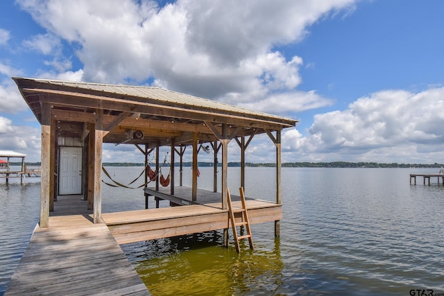 dock area featuring a water view