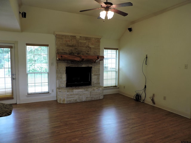 525 Peach Tree Rd, Gun Barrel City, TX 75156 - unfurnished living room with vaulted ceiling, a fireplace, wood finished floors, and a ceiling fan