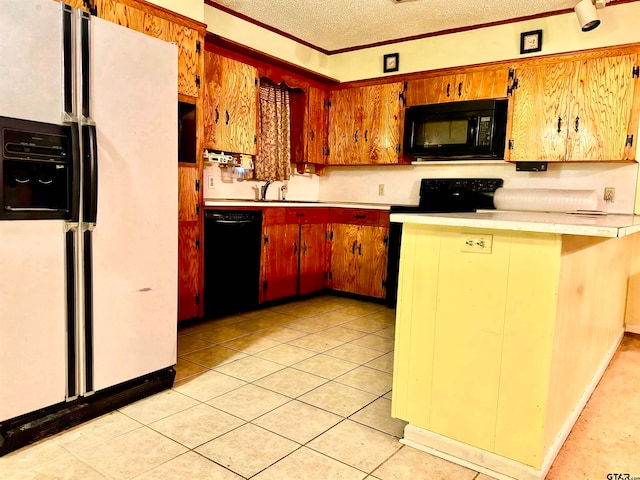 kitchen with black appliances, kitchen peninsula, a kitchen bar, a textured ceiling, and light tile patterned floors