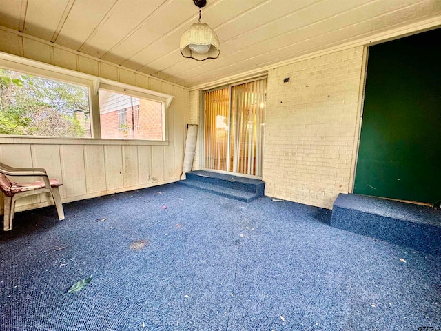 interior space with brick wall