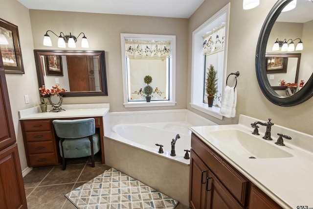 full bathroom with vanity, a garden tub, and tile patterned floors