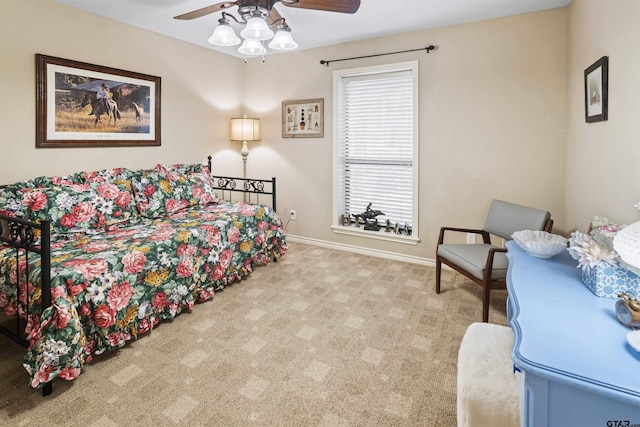 bedroom featuring carpet flooring, baseboards, and ceiling fan