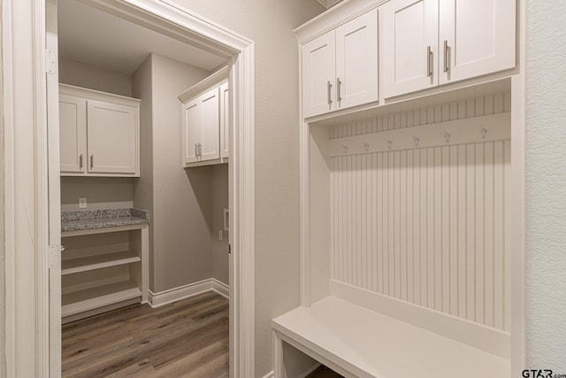 mudroom with dark hardwood / wood-style floors