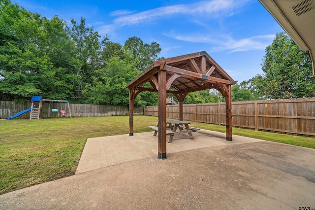 10926 Westhaven Cir, Flint, TX 75762 - fenced backyard with a gazebo, a patio, and a playground