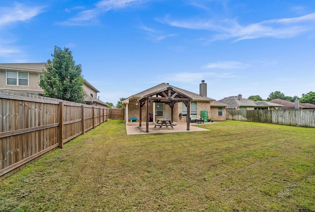 10926 Westhaven Cir, Flint, TX 75762 - rear view of property with a gazebo, a chimney, a patio area, and a fenced backyard