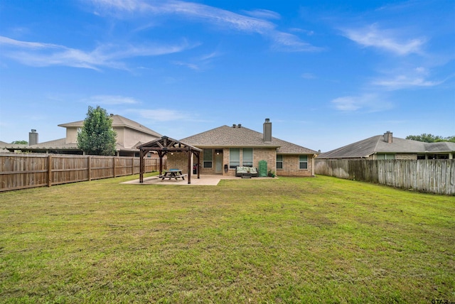 10926 Westhaven Cir, Flint, TX 75762 - rear view of house featuring a gazebo, a patio area, a fenced backyard, and a chimney