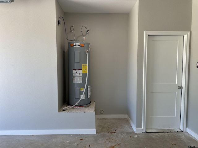 utility room with electric water heater