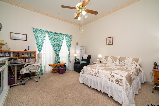 carpeted bedroom with ceiling fan and ornamental molding