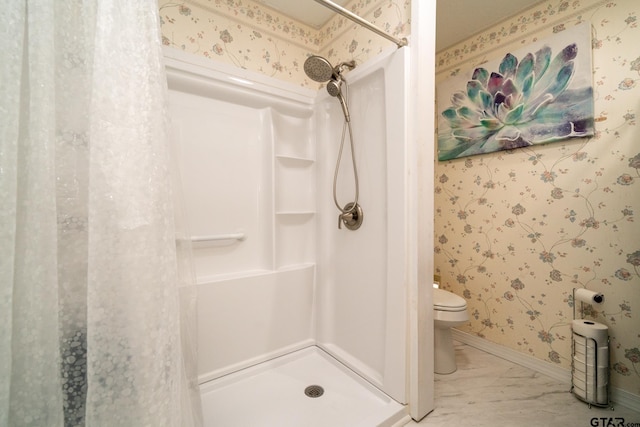 bathroom featuring a shower and toilet