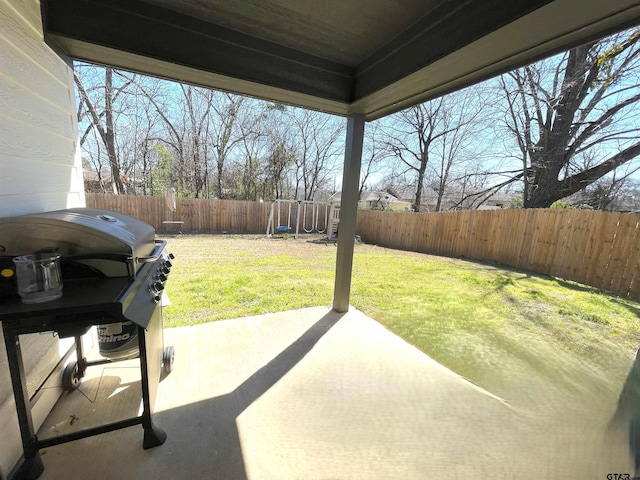 view of patio with a fenced backyard and grilling area