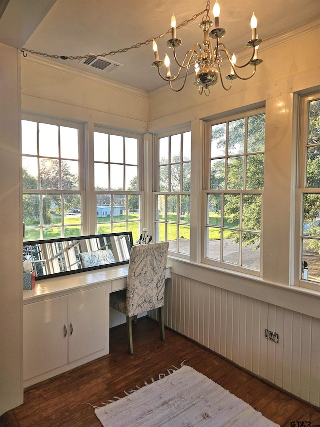 301 W Larissa, Jacksonville, TX 75766 - sunroom with ornamental molding, wood finished floors, a chandelier, healthy amount of natural light, and a deck