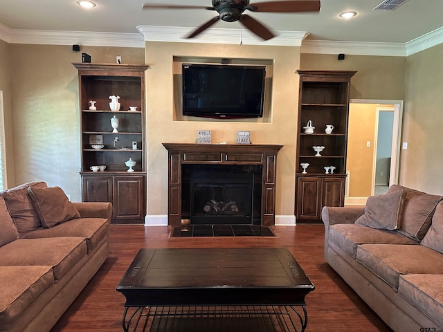 living room featuring dark wood finished floors, a ceiling fan, recessed lighting, a fireplace with flush hearth, and ornamental molding