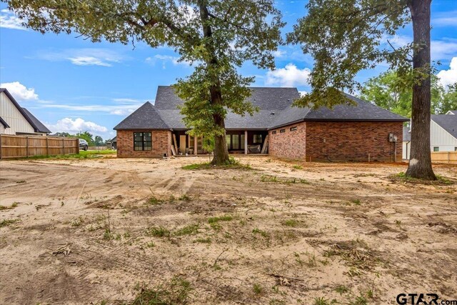 300 White-N-Gail Ln, Bullard, TX 75757 - rear view of house with roof with shingles and brick siding