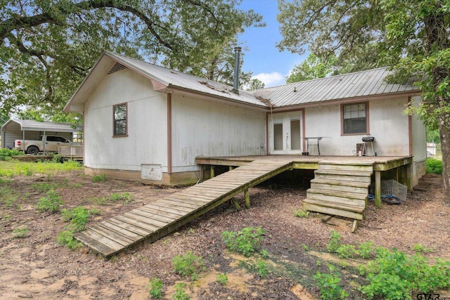 13386 Fm 858, Ben Wheeler, TX 75754 - back of house featuring french doors, metal roof, and crawl space
