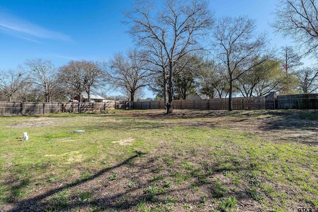 view of yard featuring fence