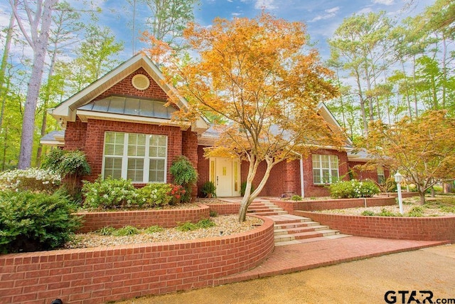 view of front facade with brick siding