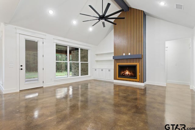 unfurnished living room featuring ceiling fan, beam ceiling, high vaulted ceiling, a fireplace, and concrete floors