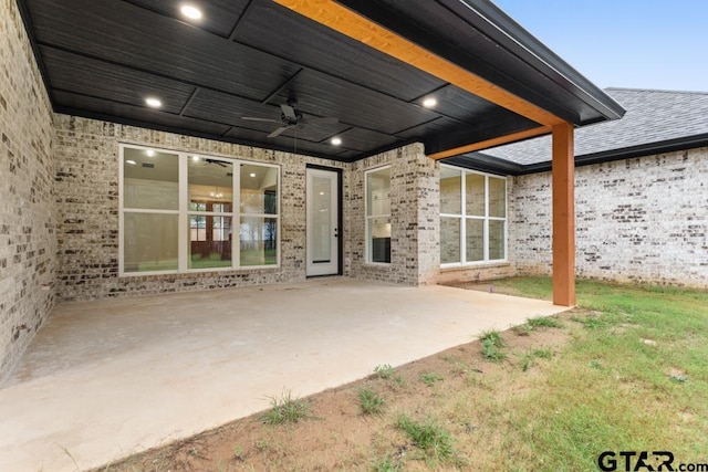 view of patio featuring ceiling fan