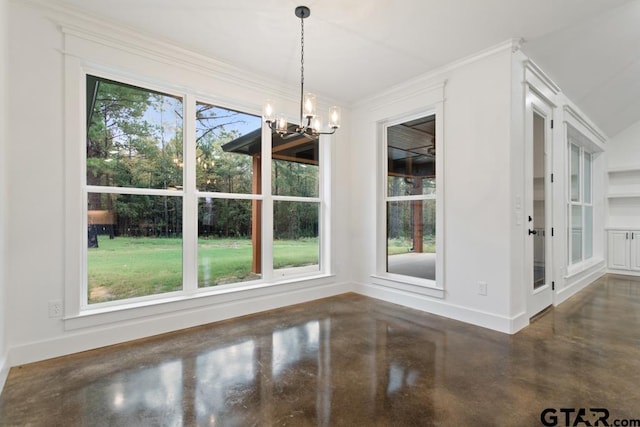 unfurnished dining area featuring a chandelier and ornamental molding