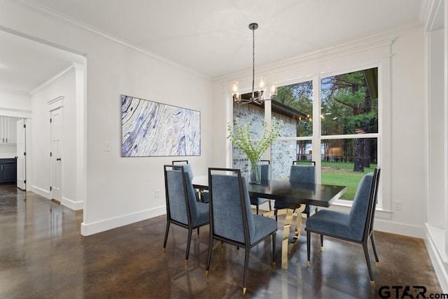 dining room featuring a chandelier and crown molding