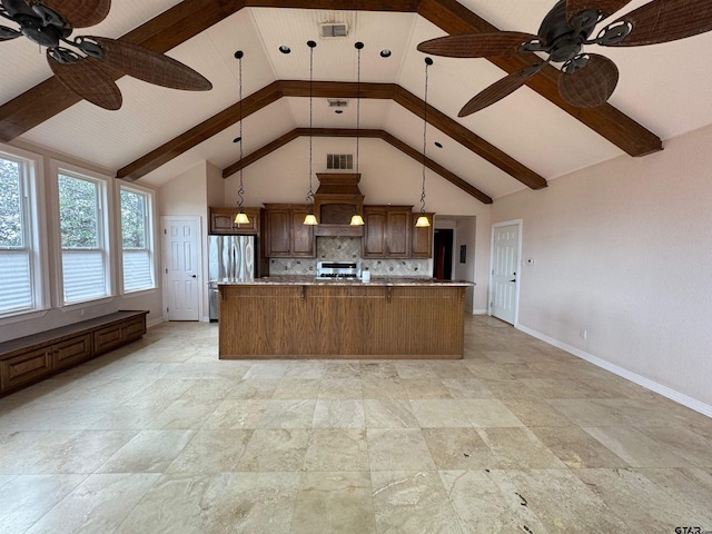 kitchen featuring visible vents, freestanding refrigerator, backsplash, and ceiling fan