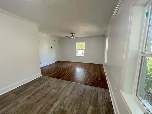 1409 W 3rd St, Tyler, TX 75701 - unfurnished room with ornamental molding, wood finished floors, and a ceiling fan