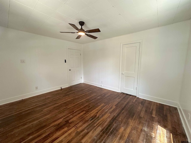 1409 W 3rd St, Tyler, TX 75701 - spare room with dark wood-style flooring and ceiling fan