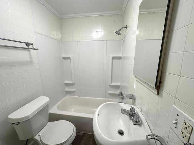 1409 W 3rd St, Tyler, TX 75701 - full bath with tile walls, ornamental molding, and washtub / shower combination