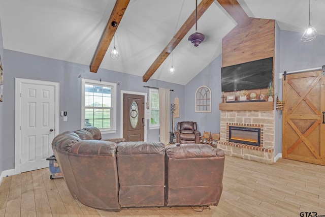 10708 C R 494, Tyler, TX 75706 - living area with wood finished floors and a stone fireplace