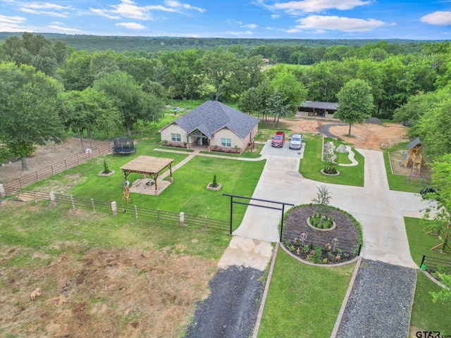 10708 C R 494, Tyler, TX 75706 - view of subject property featuring a heavily wooded area