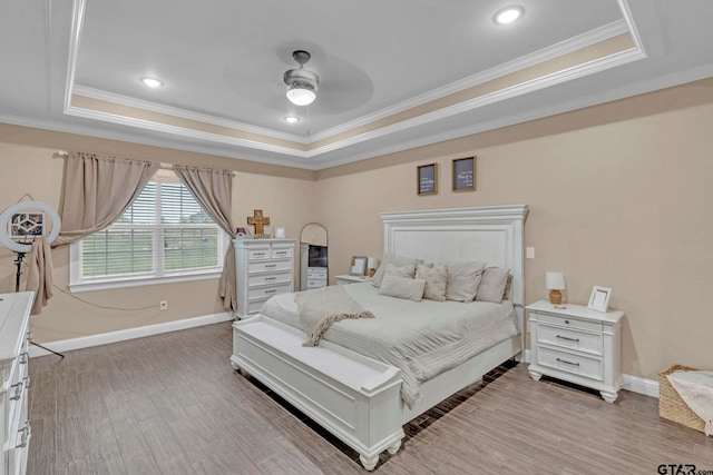 10708 C R 494, Tyler, TX 75706 - bedroom with a raised ceiling, crown molding, light wood-type flooring, a ceiling fan, and recessed lighting