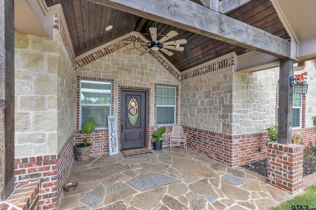 10708 C R 494, Tyler, TX 75706 - view of exterior entry with ceiling fan, brick siding, and stone siding