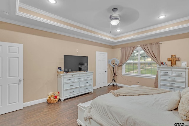 10708 C R 494, Tyler, TX 75706 - bedroom with crown molding, a tray ceiling, wood finished floors, a ceiling fan, and recessed lighting