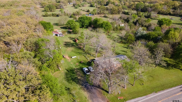 birds eye view of property with a rural view