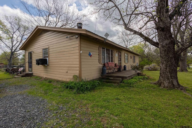 view of home's exterior with a lawn